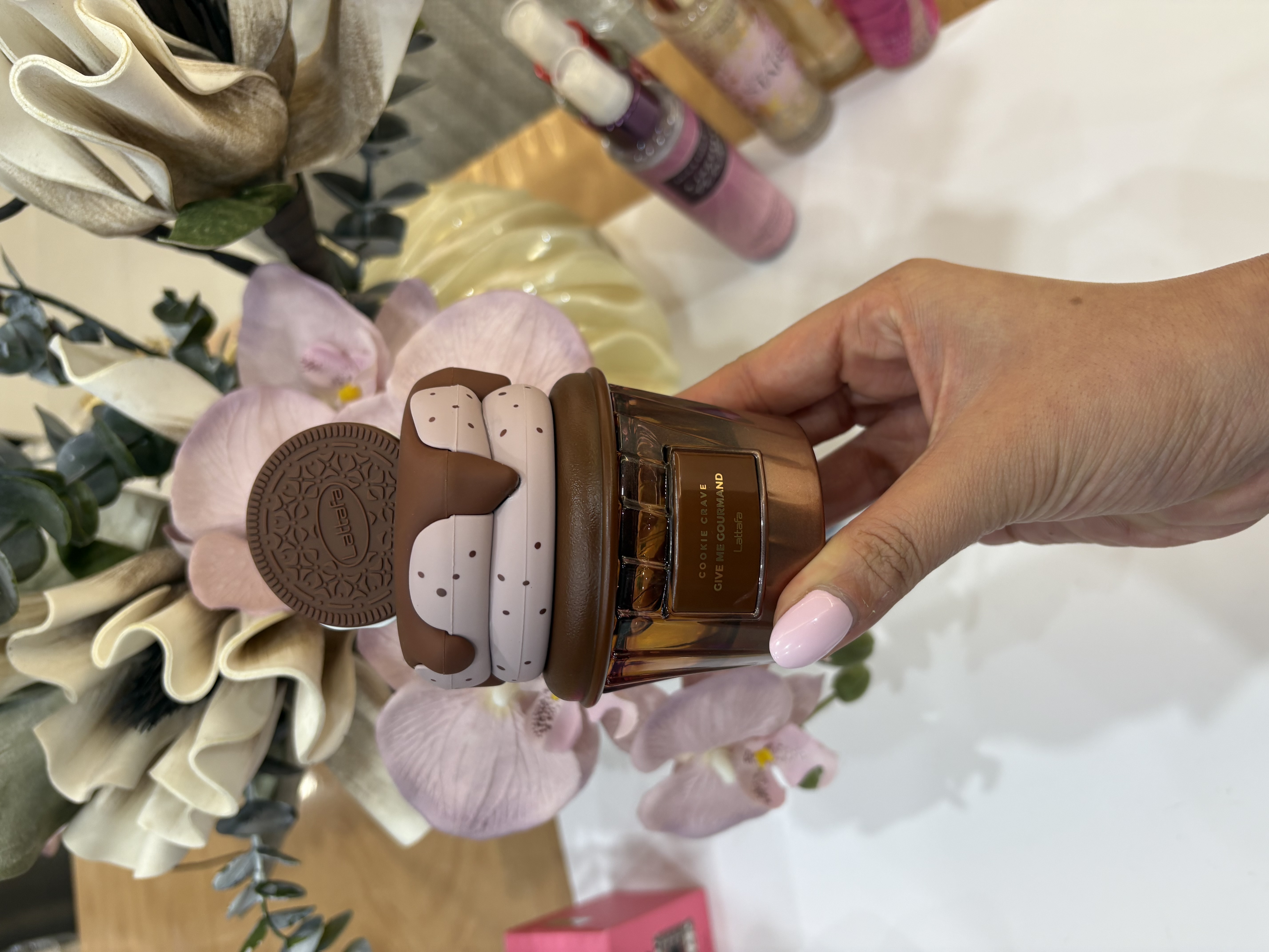 عطر ادوپرفیوم زنانه لطافه مدل کوکی کریو حجم ۷۵ میلی لیتر شیرین گرم